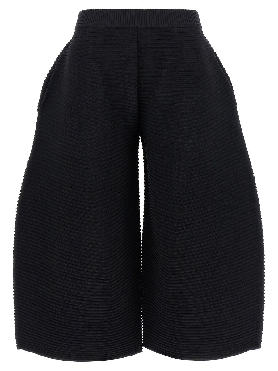 Issey Miyake 48% polyester trousers in black
