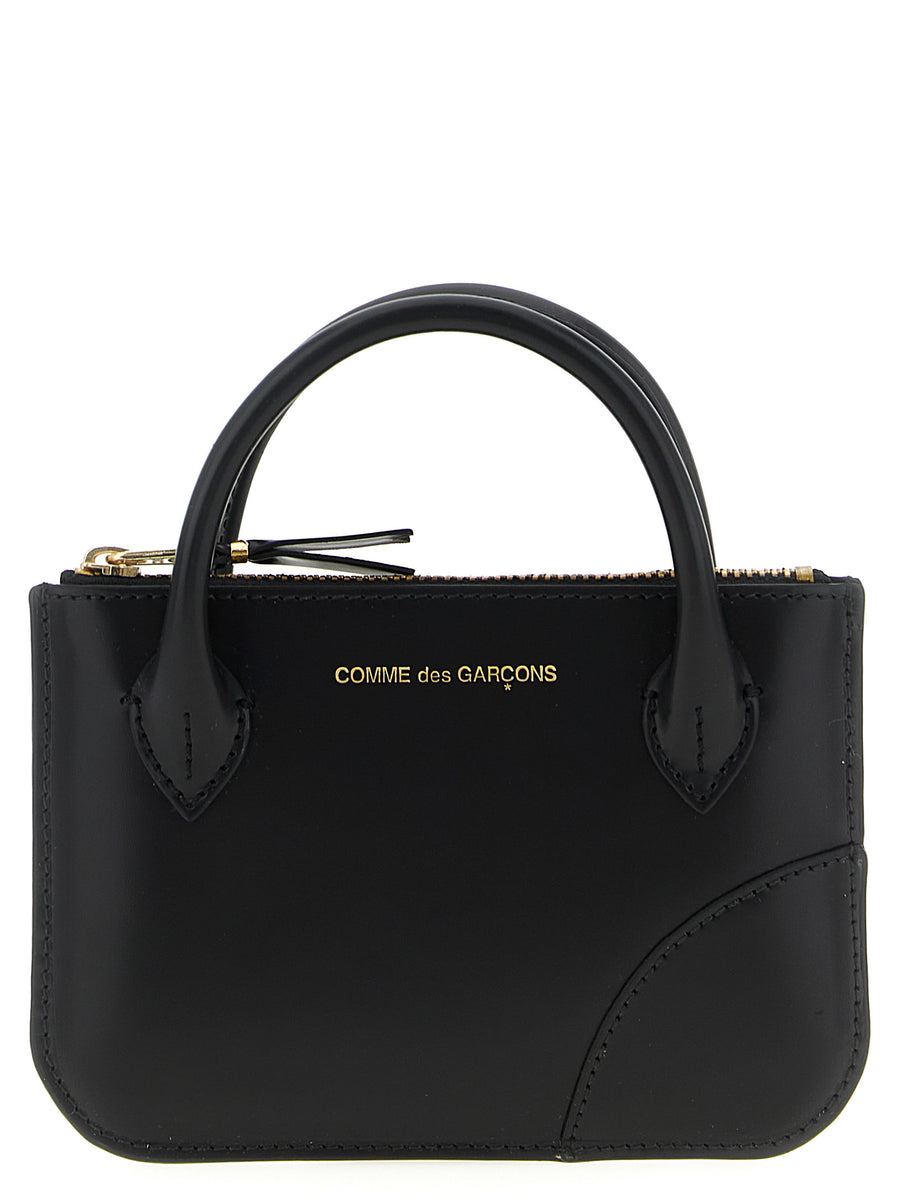 Comme des Garçons 100% cowhide leather card case in black