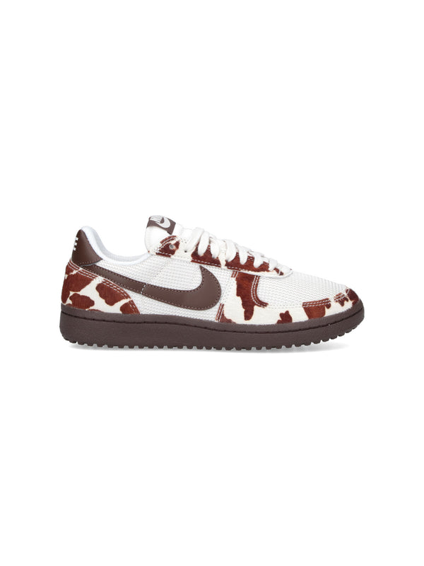 Nike Mesh with leather accents; rubber sole sneaker in white