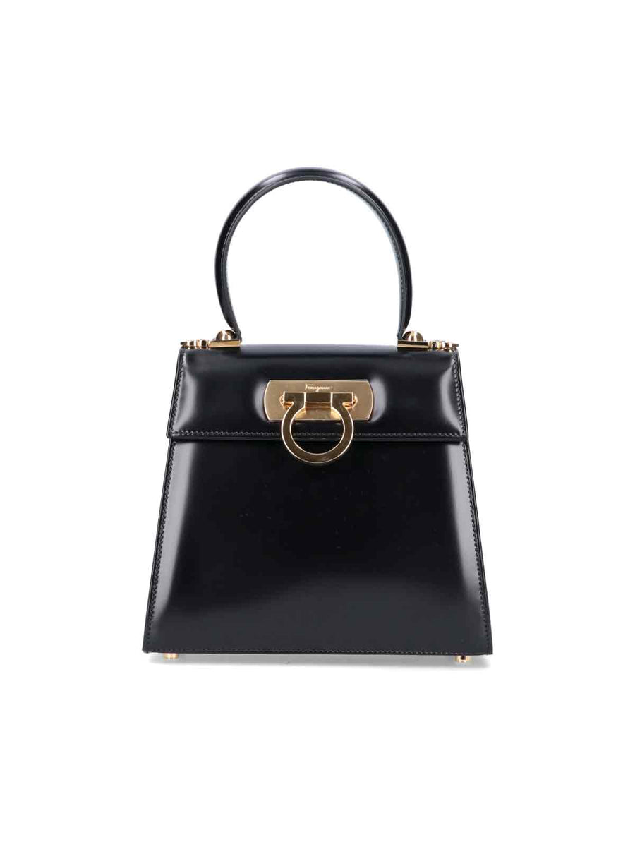 Ferragamo 100% Calf Leather; Lining: 58% Nylon top handle bag in black