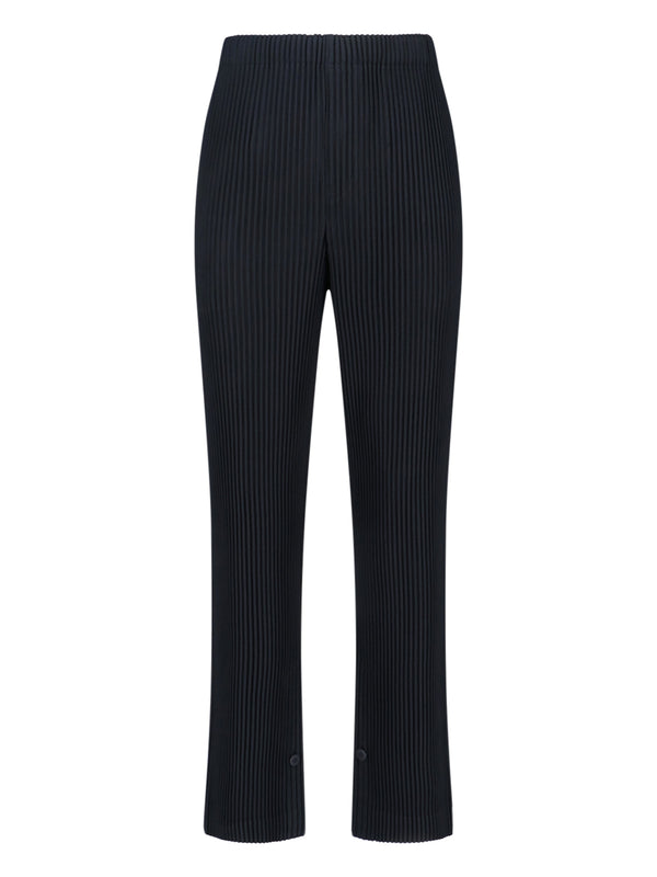 Homme Plisse' Issey Miyake 100% polyester trousers in black