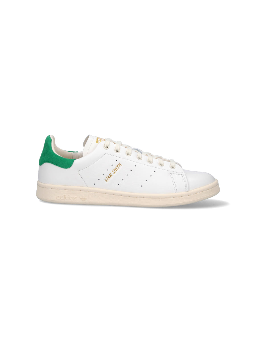 Adidas Upper: leather / suede heel counter sneaker in white