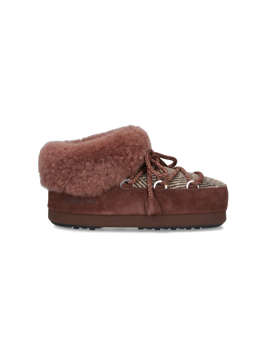 Moon Boot Upper: 64% Leather boot in brown