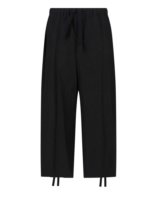Sacai 100% Cotton trousers in black