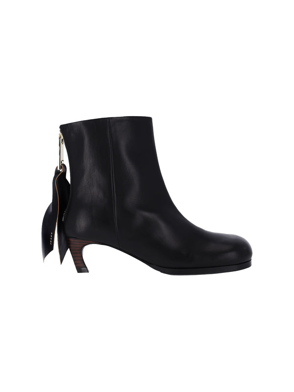 Sacai Upper: 100% Cowhide ankle boot in black
