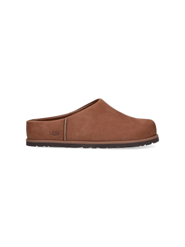 UGG Upper: 100% Leather slipper in brown