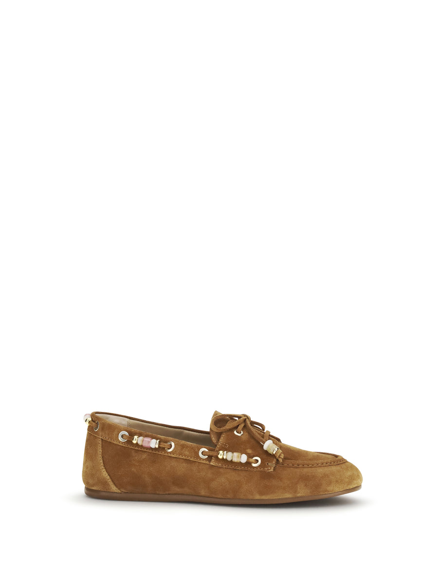 Stuart Weitzman Upper: 100% calf leather (Bos taurus); Sole: 100% rubber loafer in brown