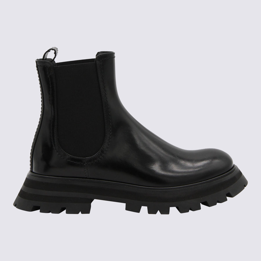 Alexander McQueen Leather upper and sole boot in black