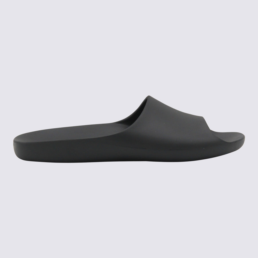 The Row Upper: 100% EVA; Sole: 100% EVA slide in black