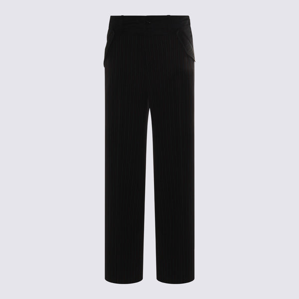 Sacai 55% wool trousers in black