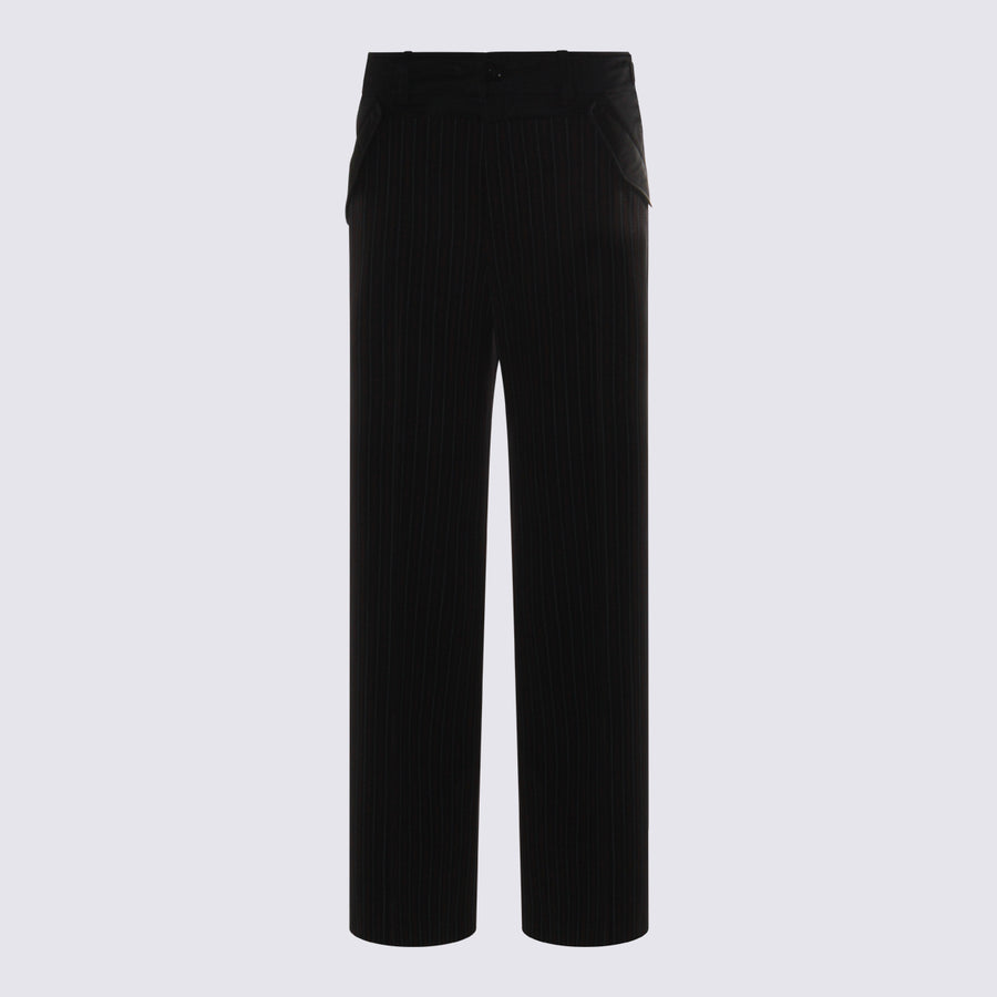 Sacai 55% wool trousers in black