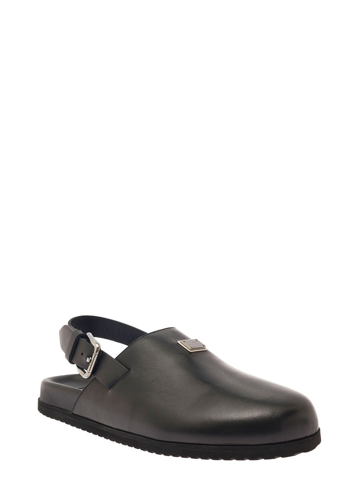 Black Clogs With Buclkle And Logo Plaque Smooth Leather Man Calf Flat Shoes