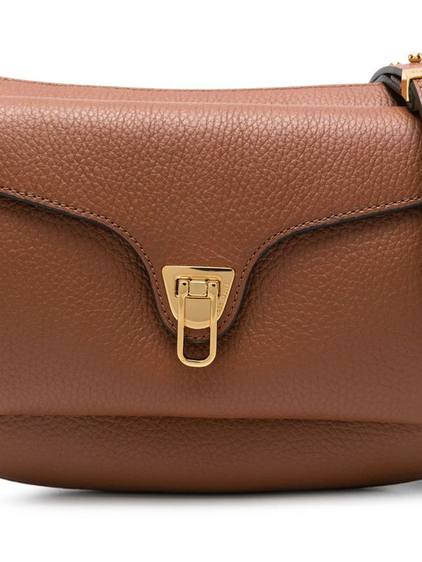 Coccinelle 60% Cow Leather crossbody bag in cognac