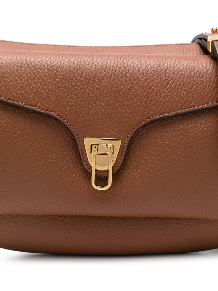 Coccinelle 60% Cow Leather crossbody bag in cognac