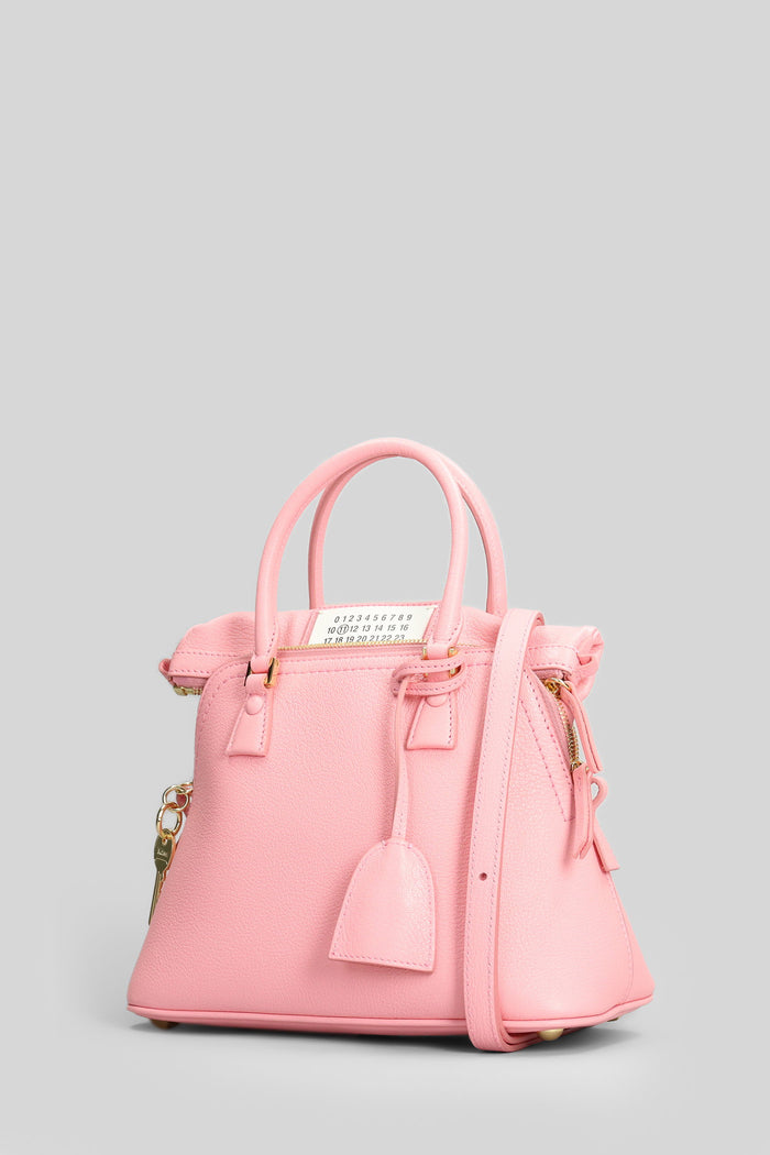 Hand bag in rose-pink leather Borse