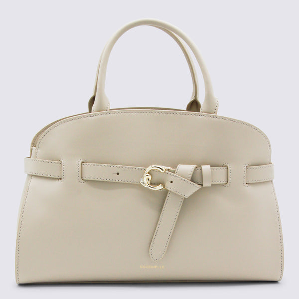 Coccinelle 100% leather top handle bag in beige