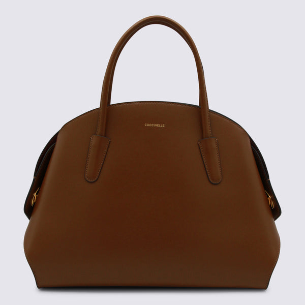 Coccinelle 100% Leather top handle bag in cognac