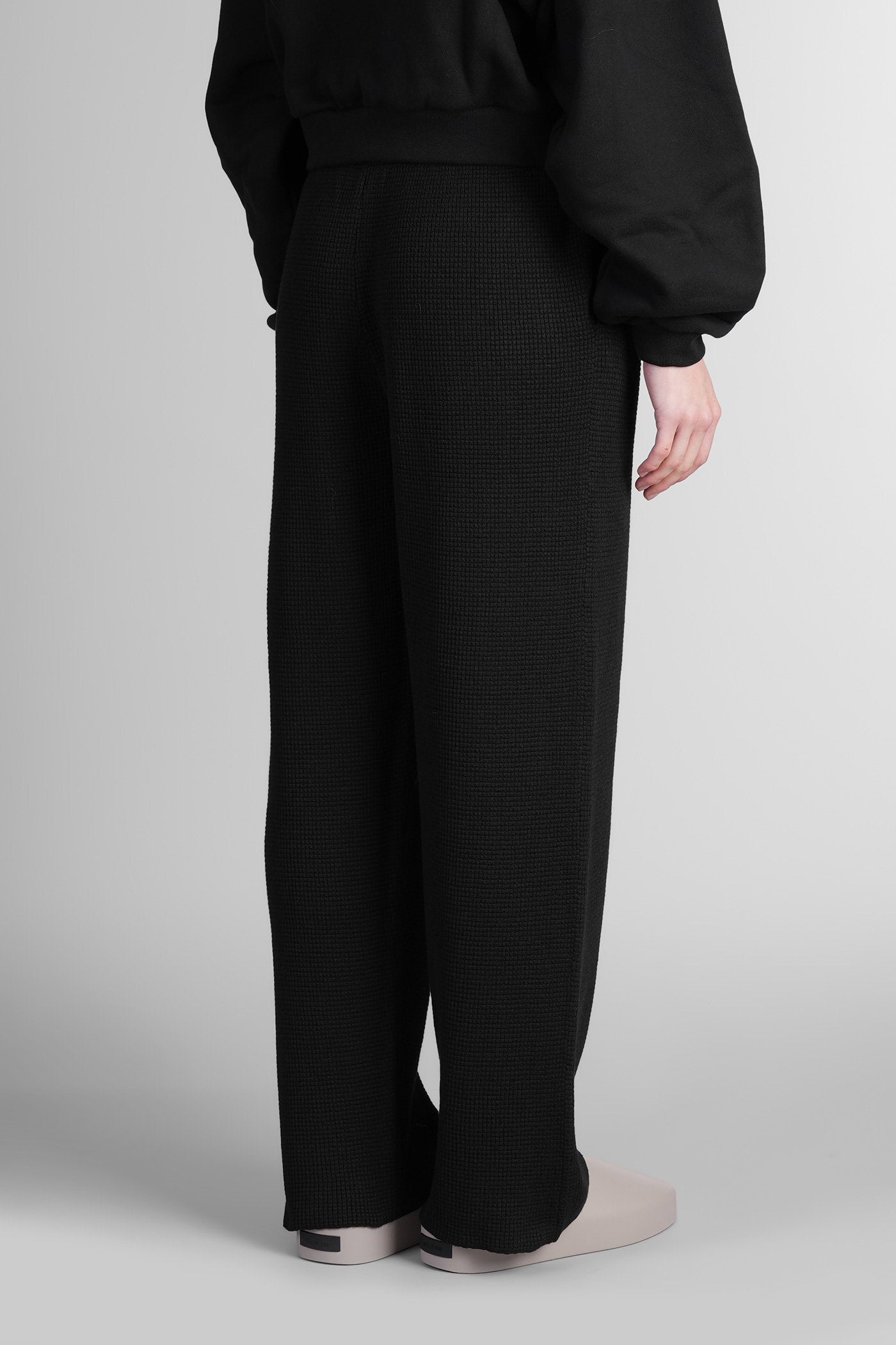Pants in black polyester Abbigliamento