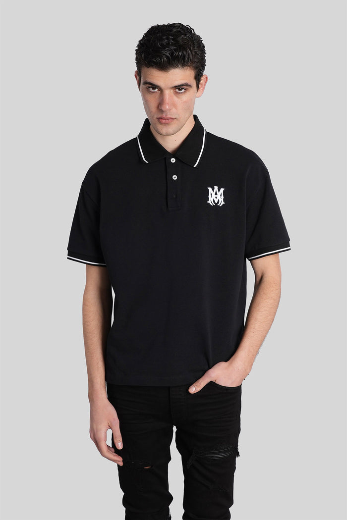 Polo in black cotton Abbigliamento