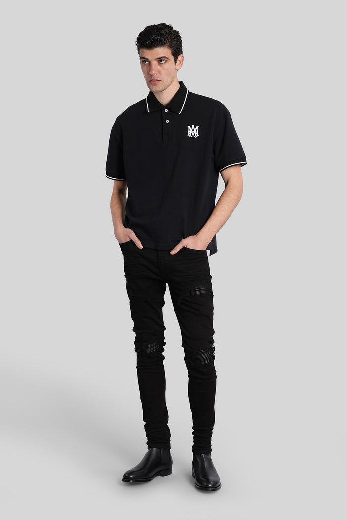 Polo in black cotton Abbigliamento