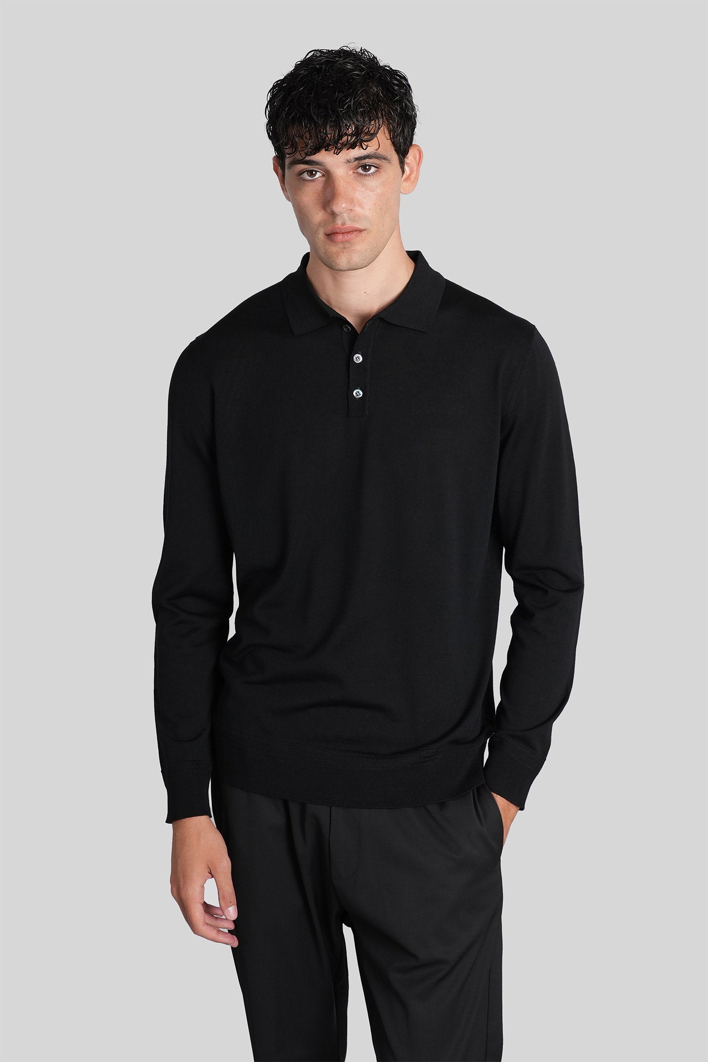 Pevaron Polo in black wool Abbigliamento