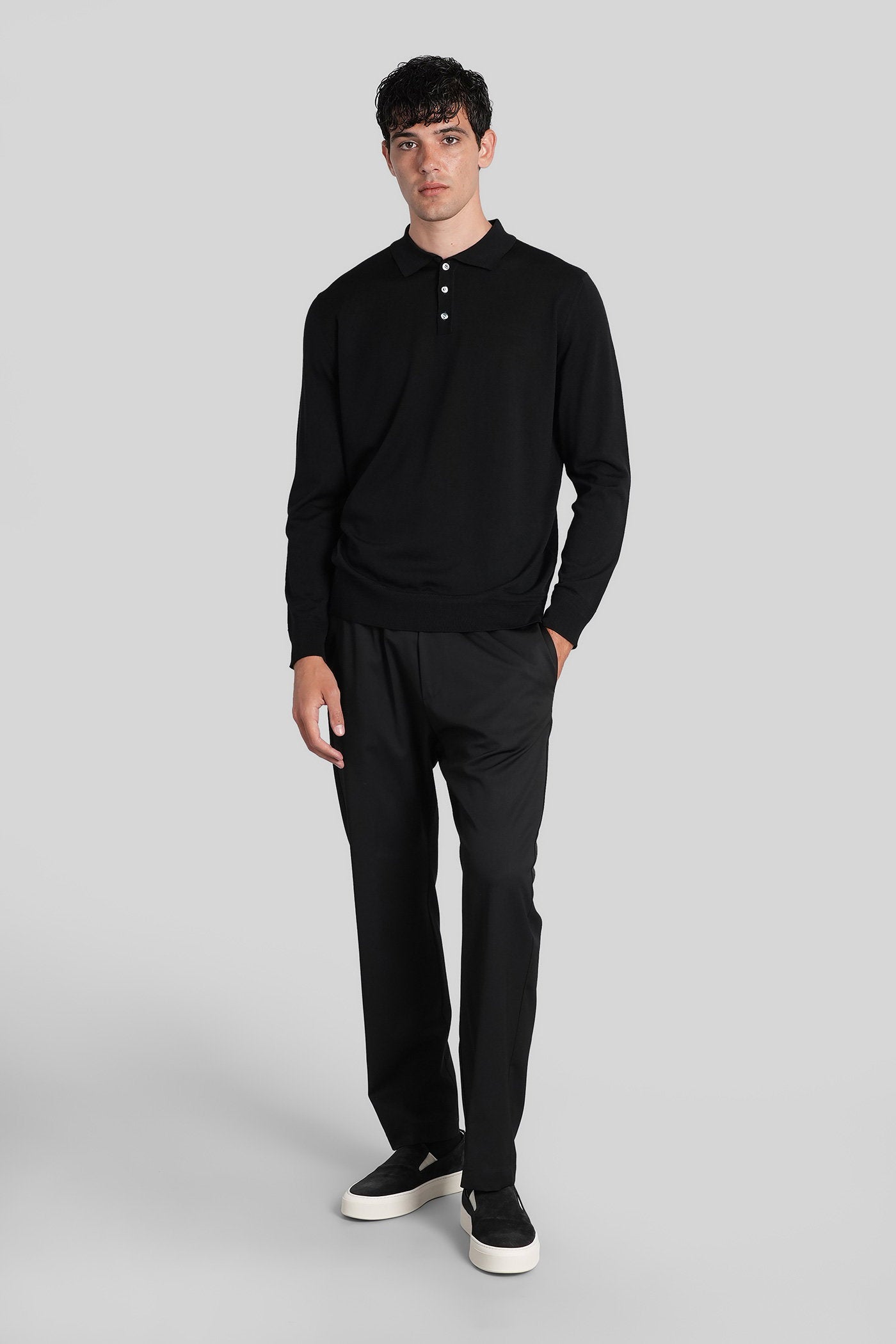 Pevaron Polo in black wool Abbigliamento