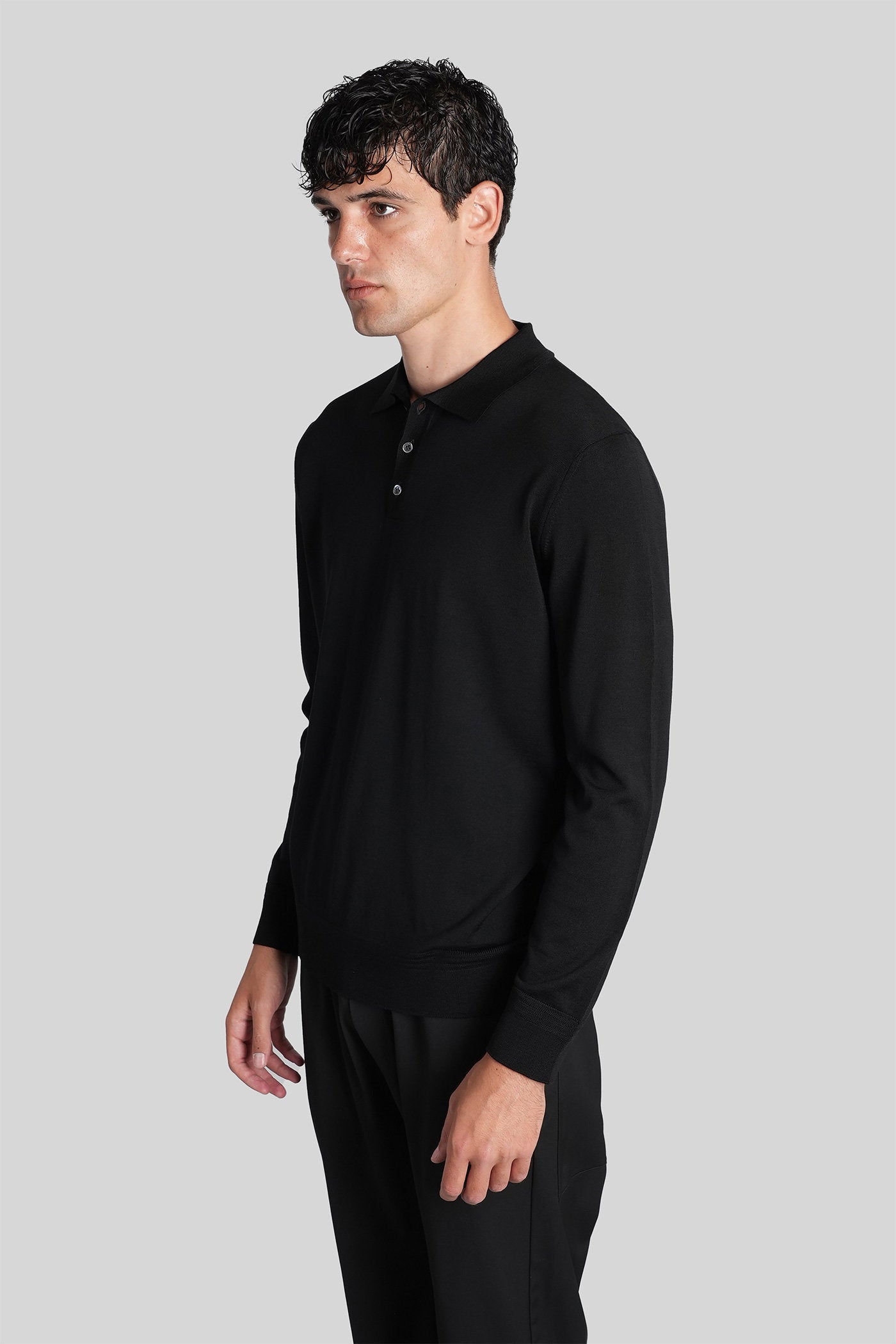 Pevaron Polo in black wool Abbigliamento