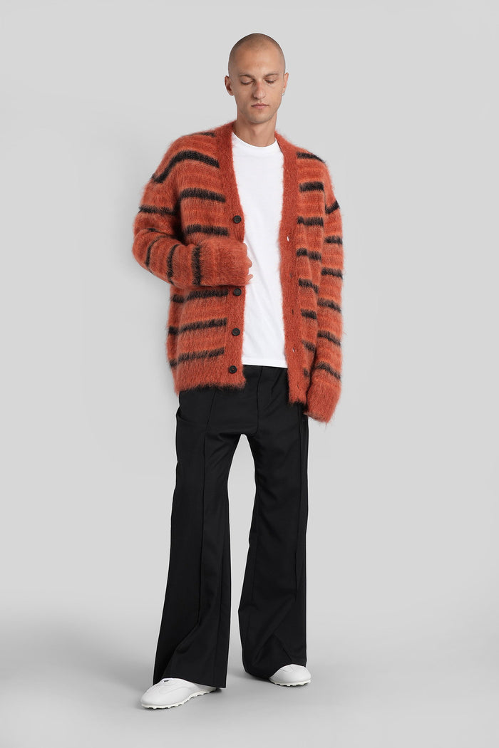 Cardigan in orange wool Abbigliamento