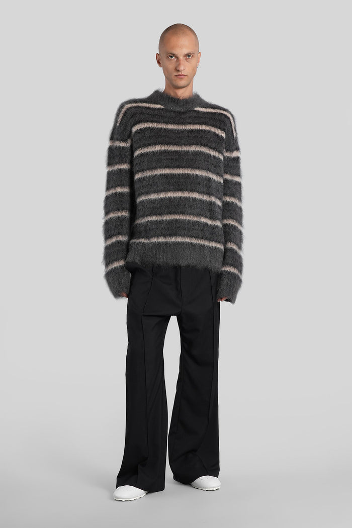 Knitwear in black wool Abbigliamento