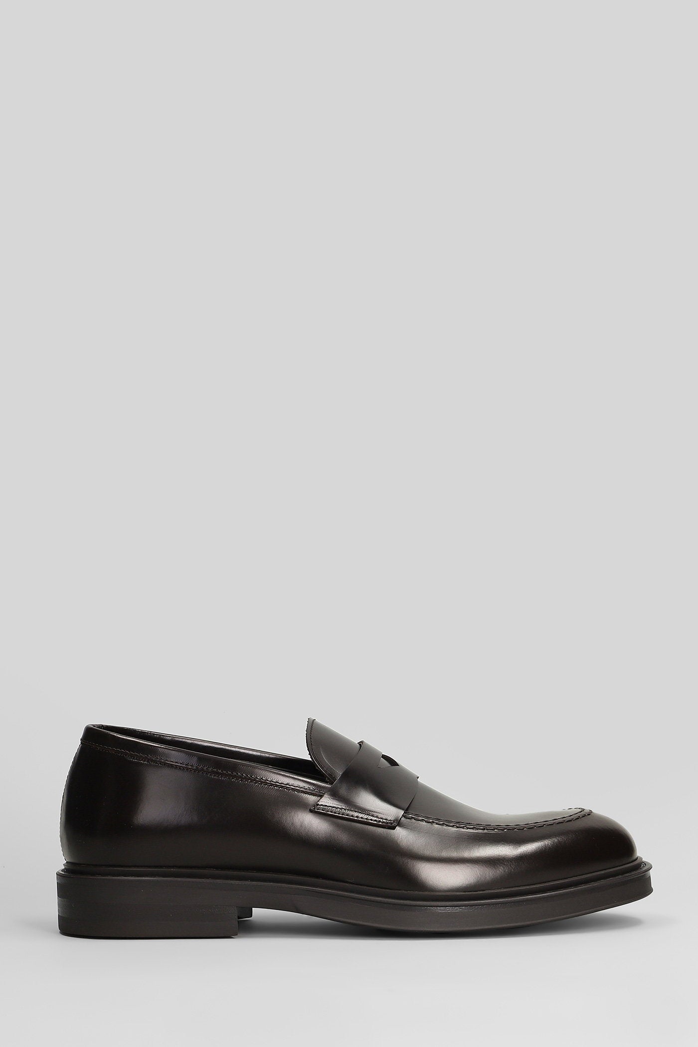 Loafers in dark brown leather Scarpe