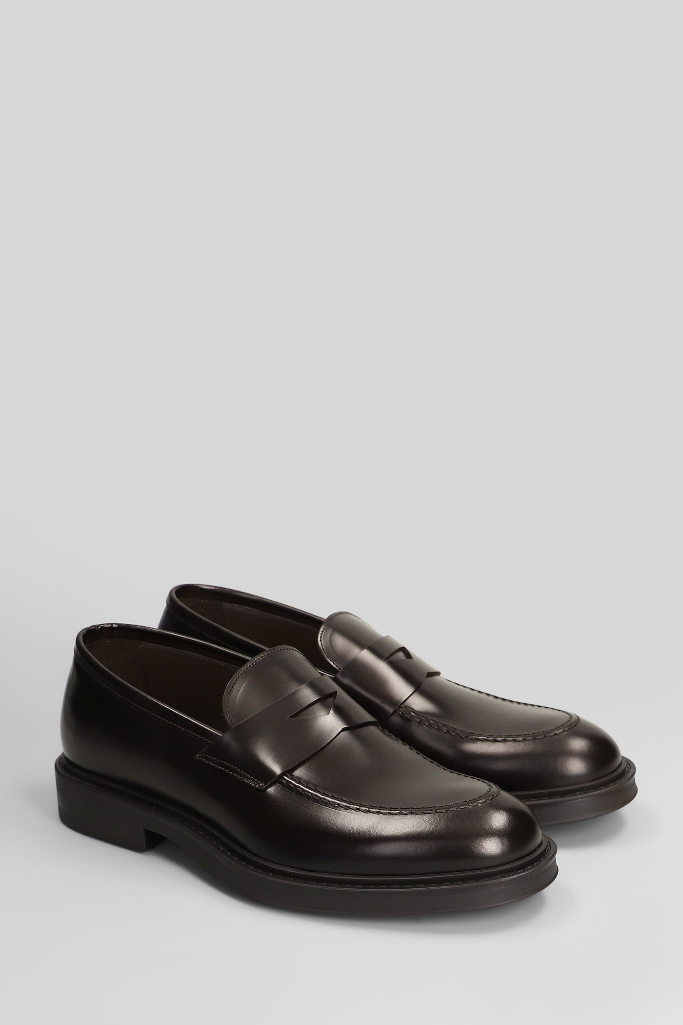 Loafers in dark brown leather Scarpe