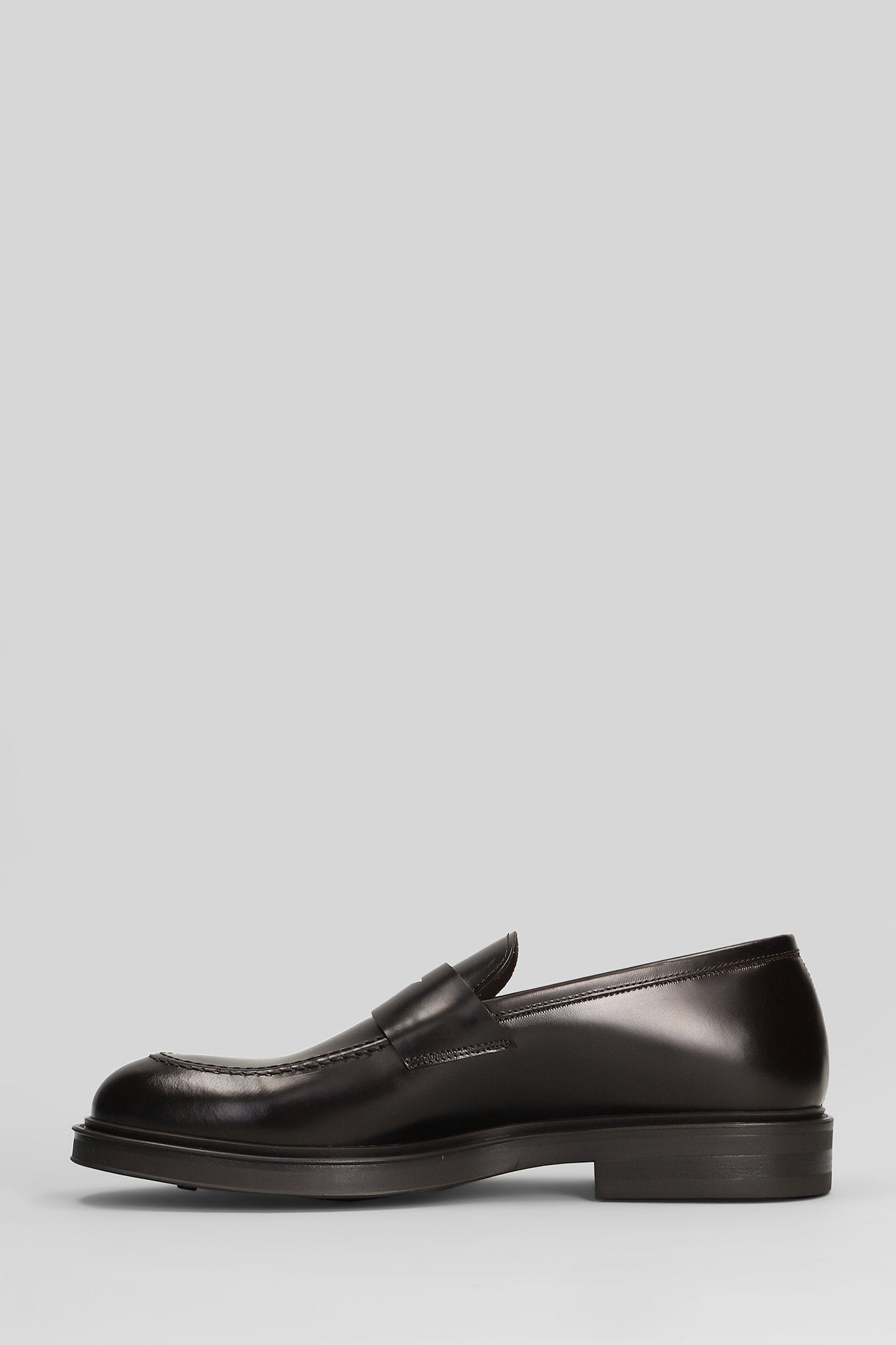 Loafers in dark brown leather Scarpe