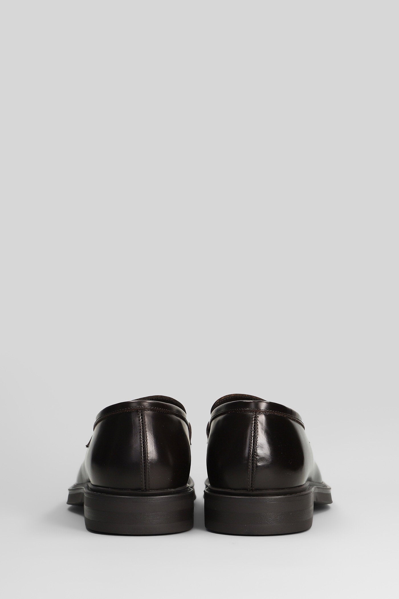 Loafers in dark brown leather Scarpe