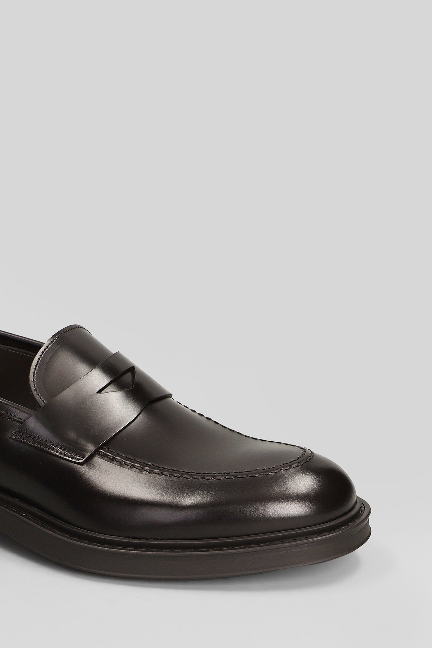 Loafers in dark brown leather Scarpe