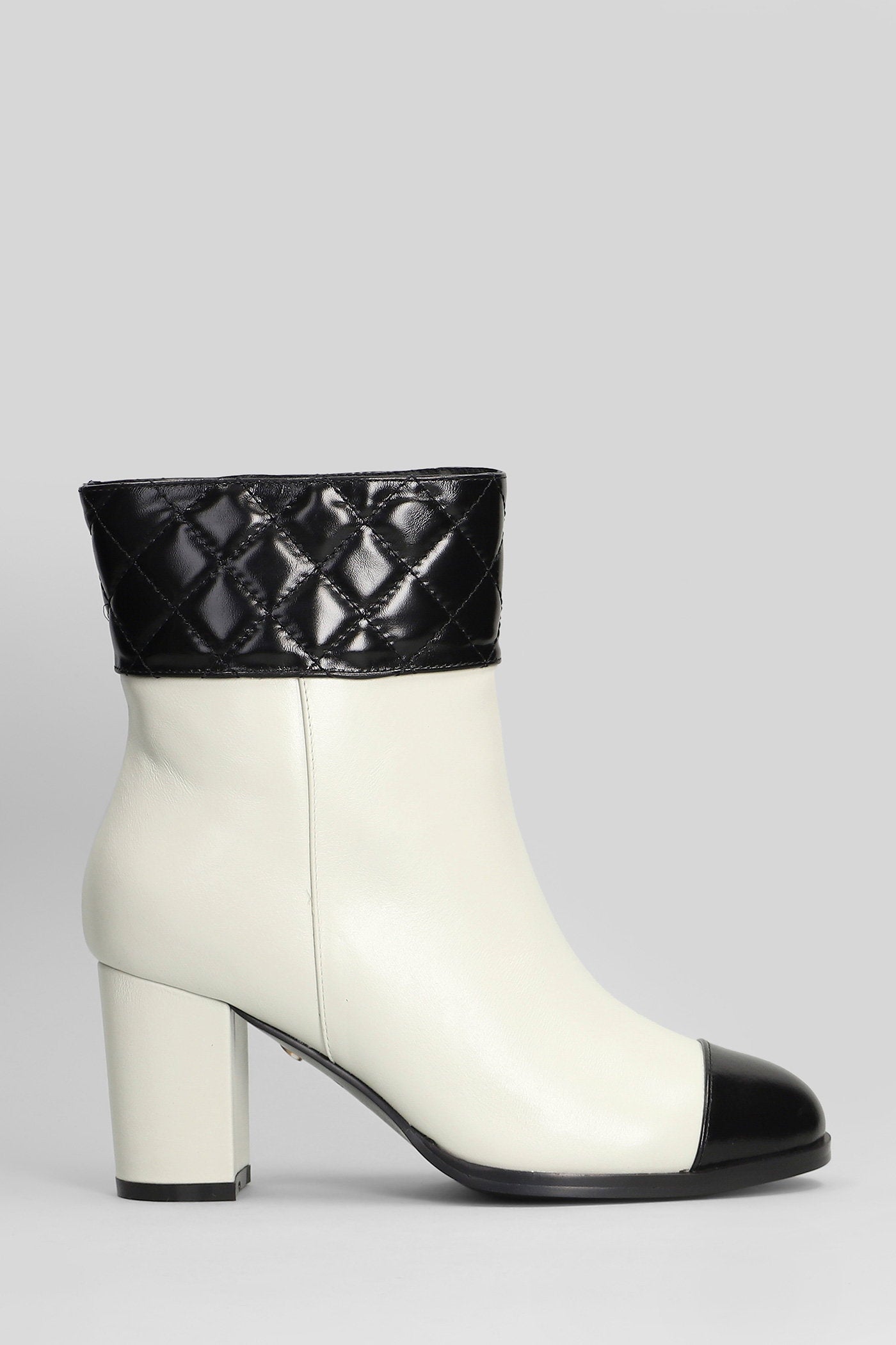 Tulli High heels Ankle boots in beige leather Scarpe
