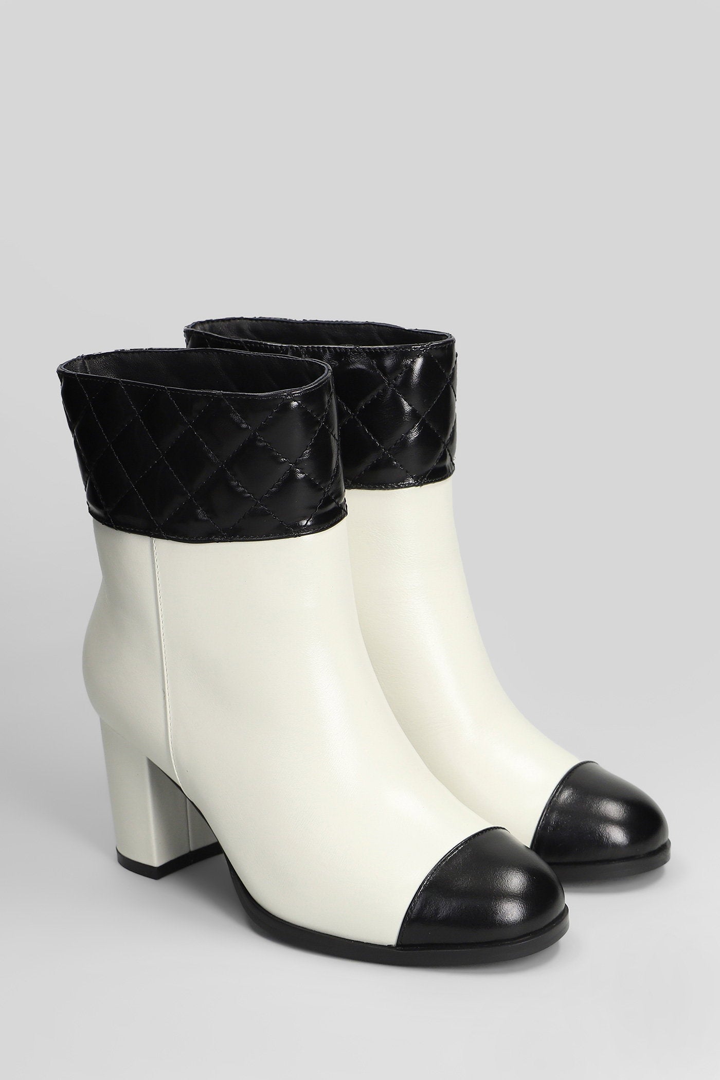 Tulli High heels Ankle boots in beige leather Scarpe
