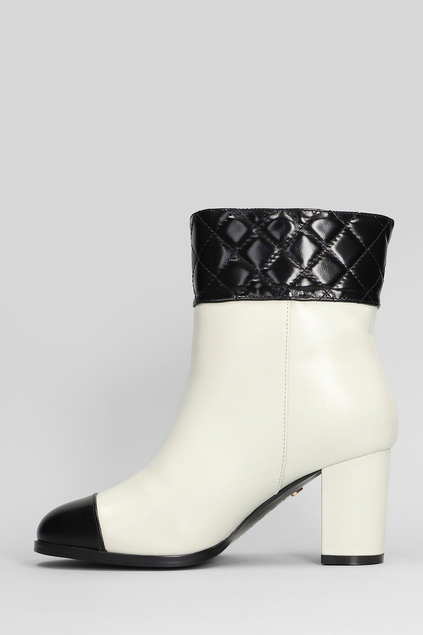Tulli High heels Ankle boots in beige leather Scarpe