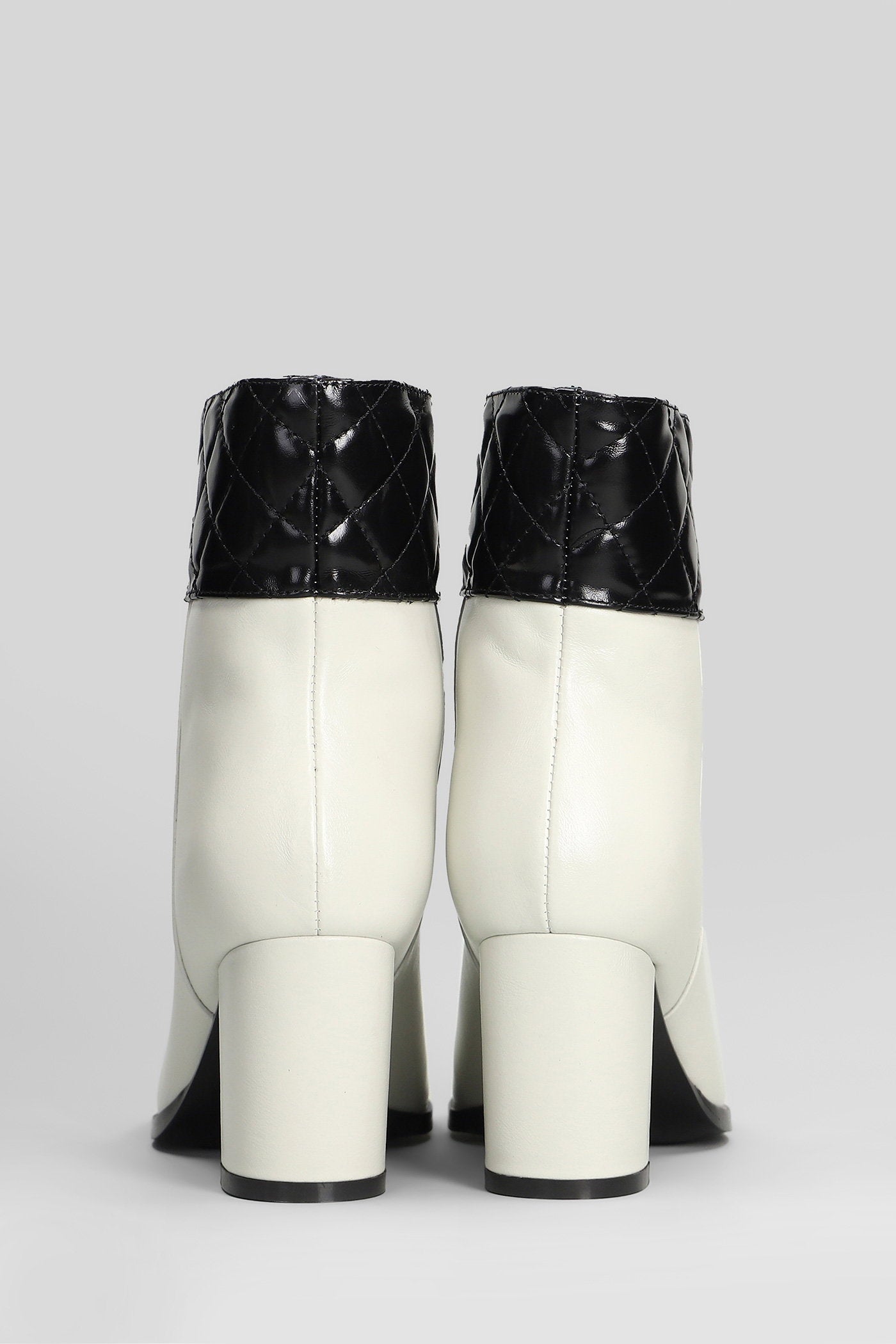Tulli High heels Ankle boots in beige leather Scarpe