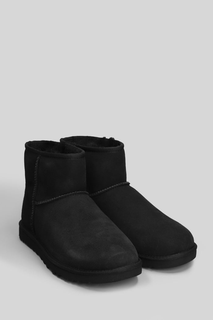 Classic Mini low heels Ankle boots in black suede Scarpe