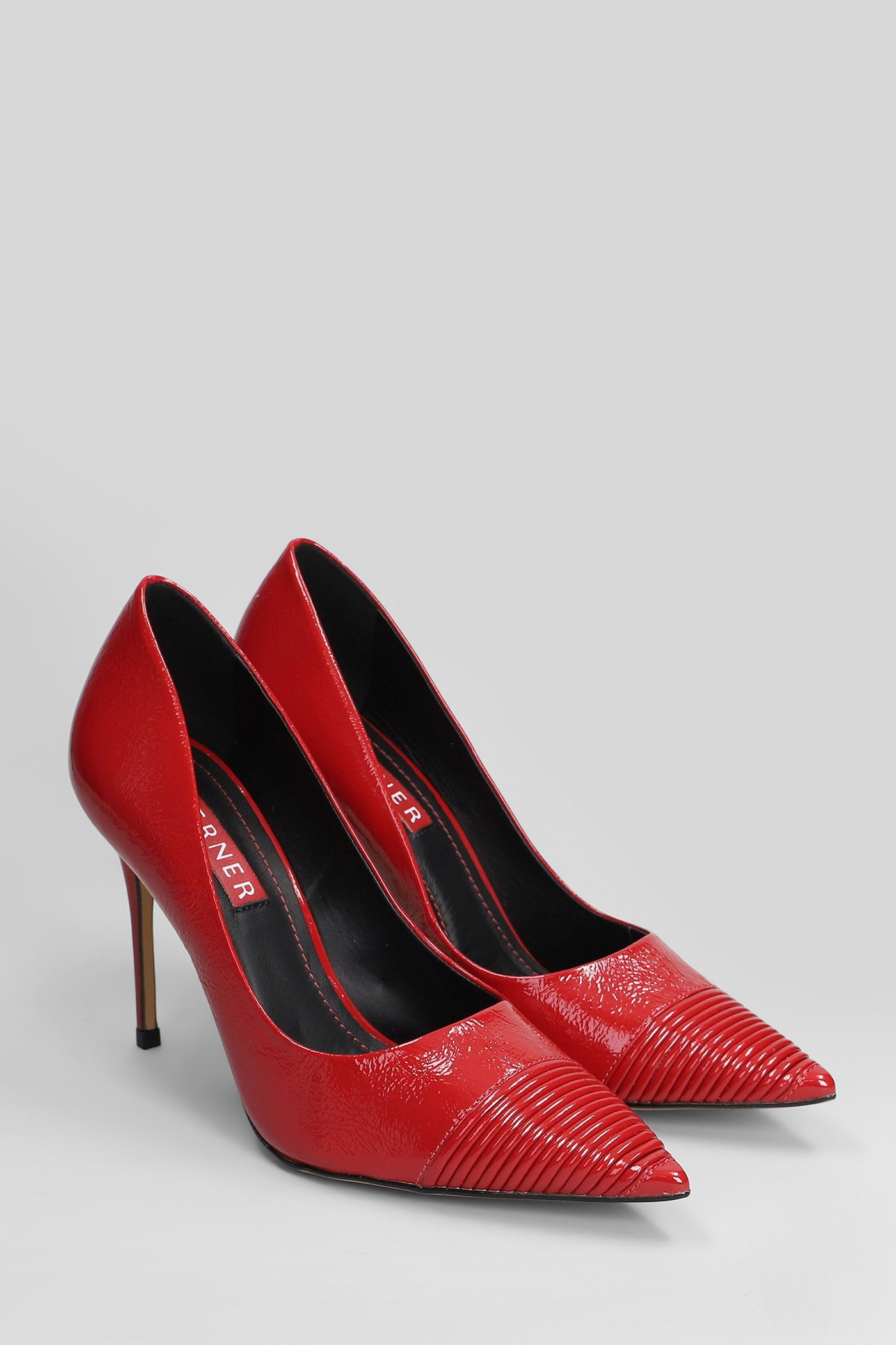 Pumps in red patent leather Scarpe