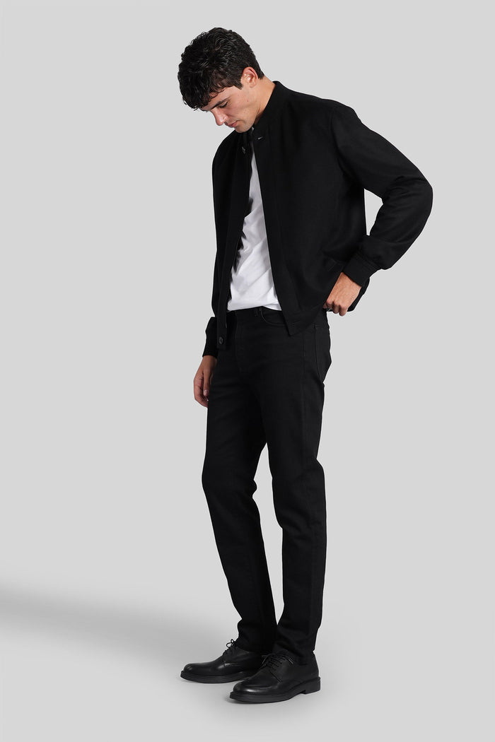 Jeans in black denim Abbigliamento