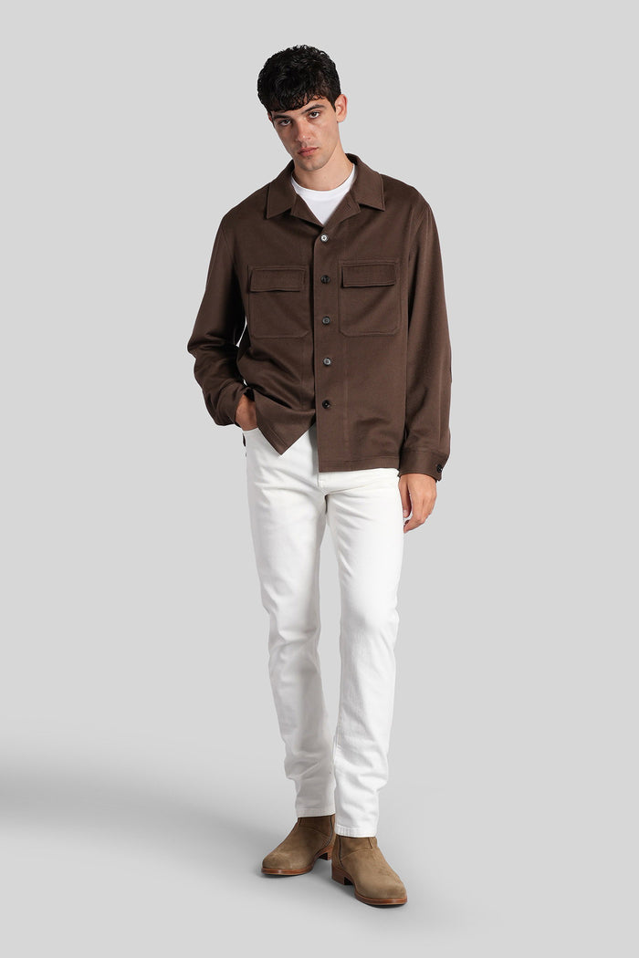 Jeans in white denim Abbigliamento