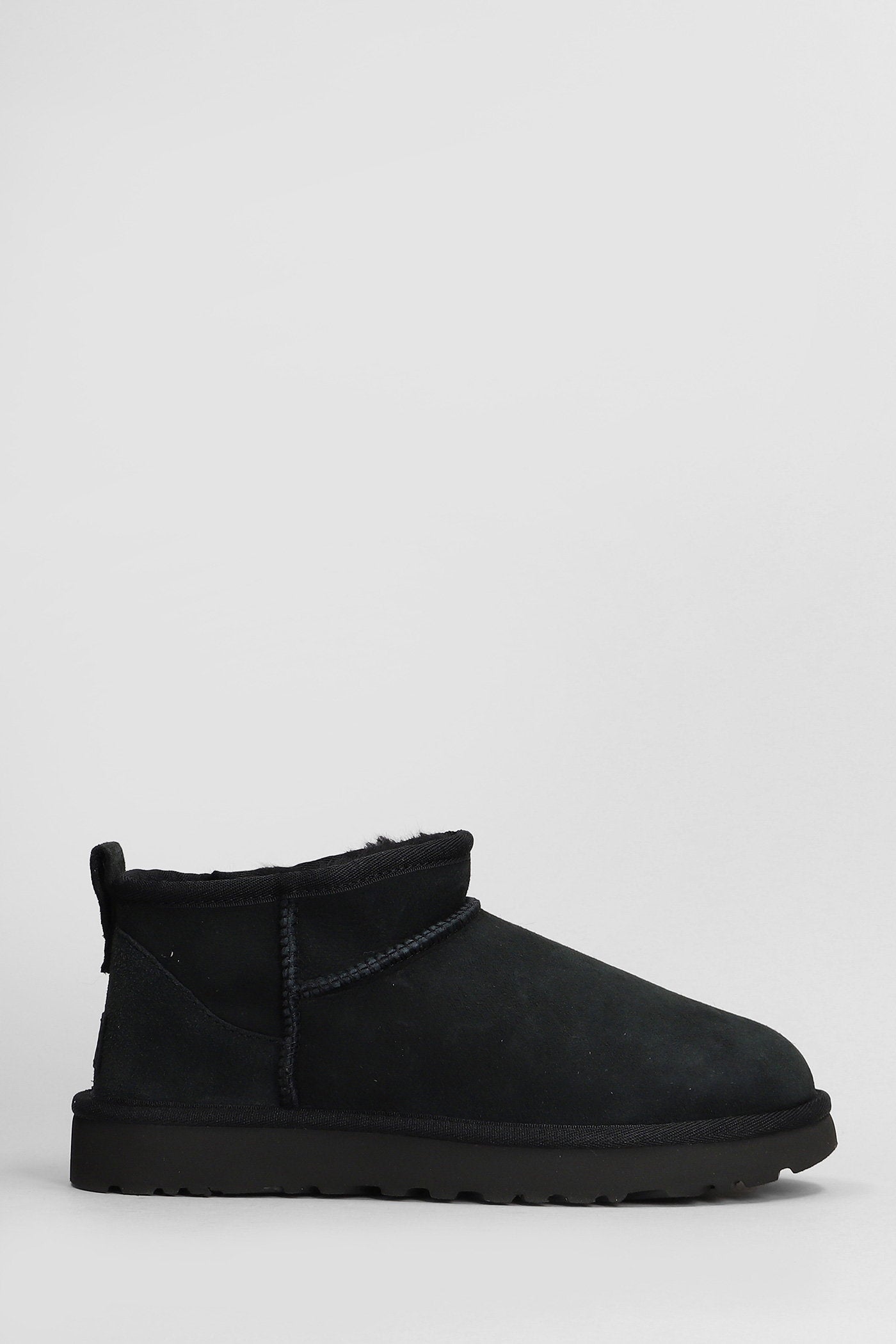 Classic Ultra Mini low heels Ankle boots in black suede Scarpe