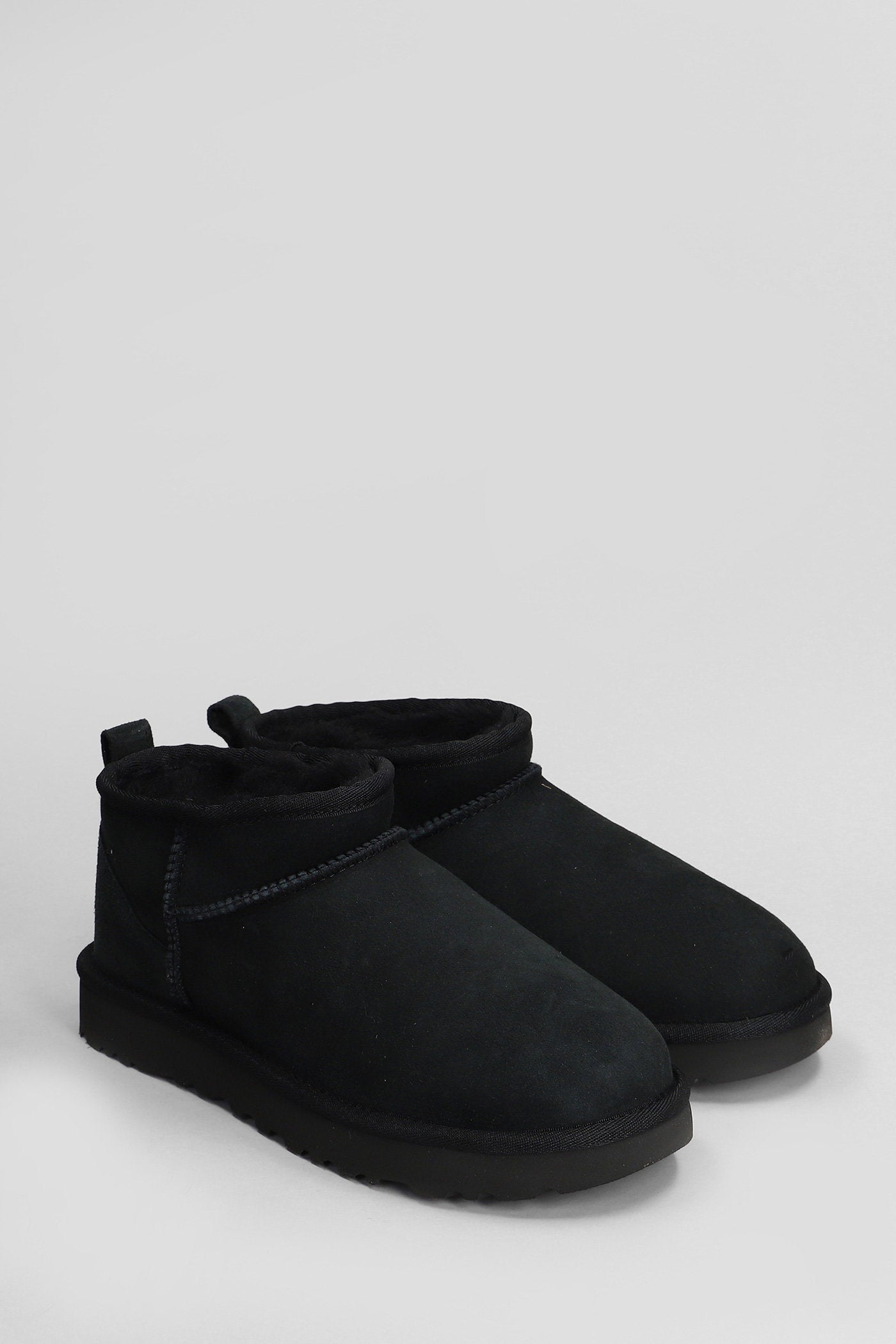 Classic Ultra Mini low heels Ankle boots in black suede Scarpe