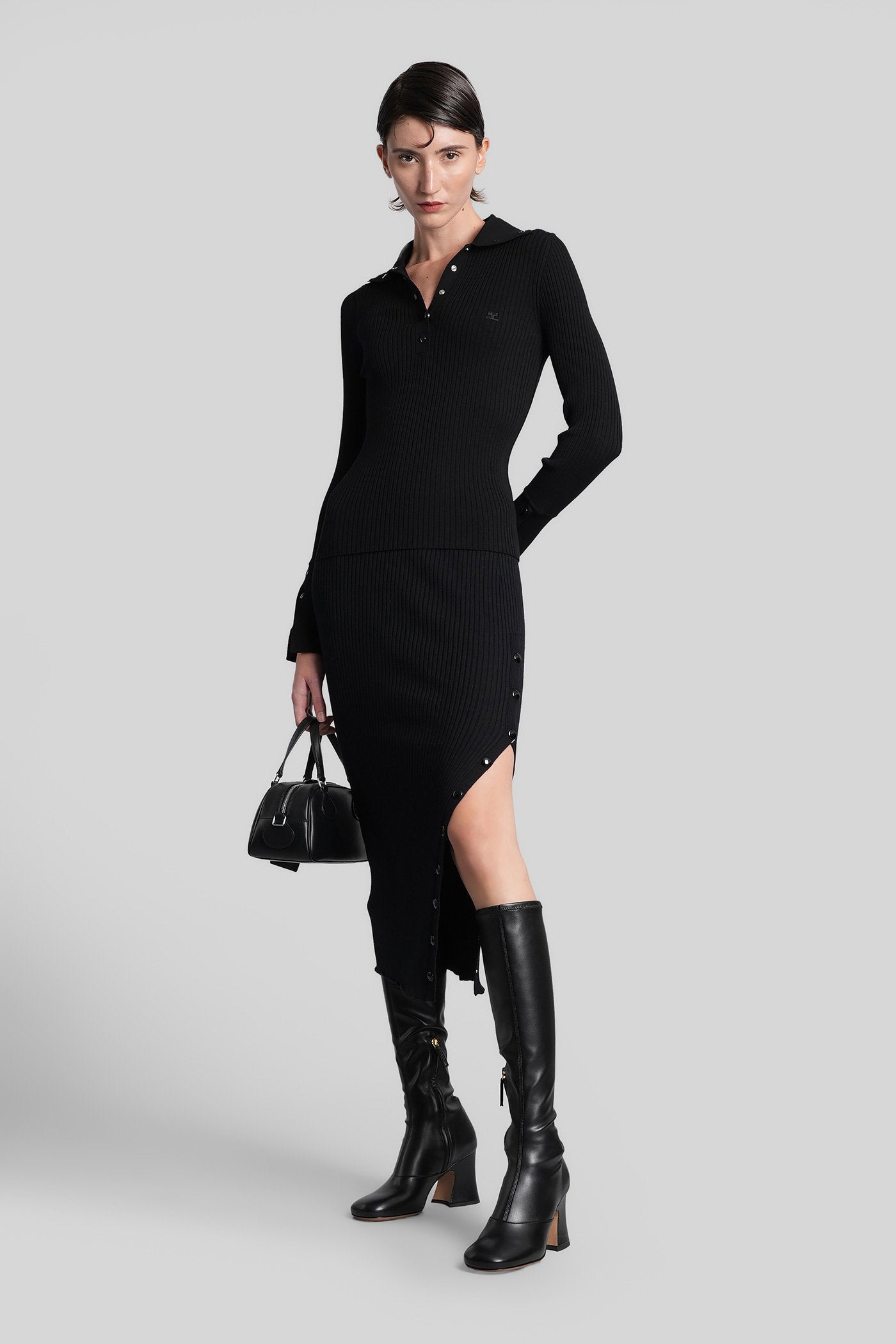 Polo in black viscose Abbigliamento