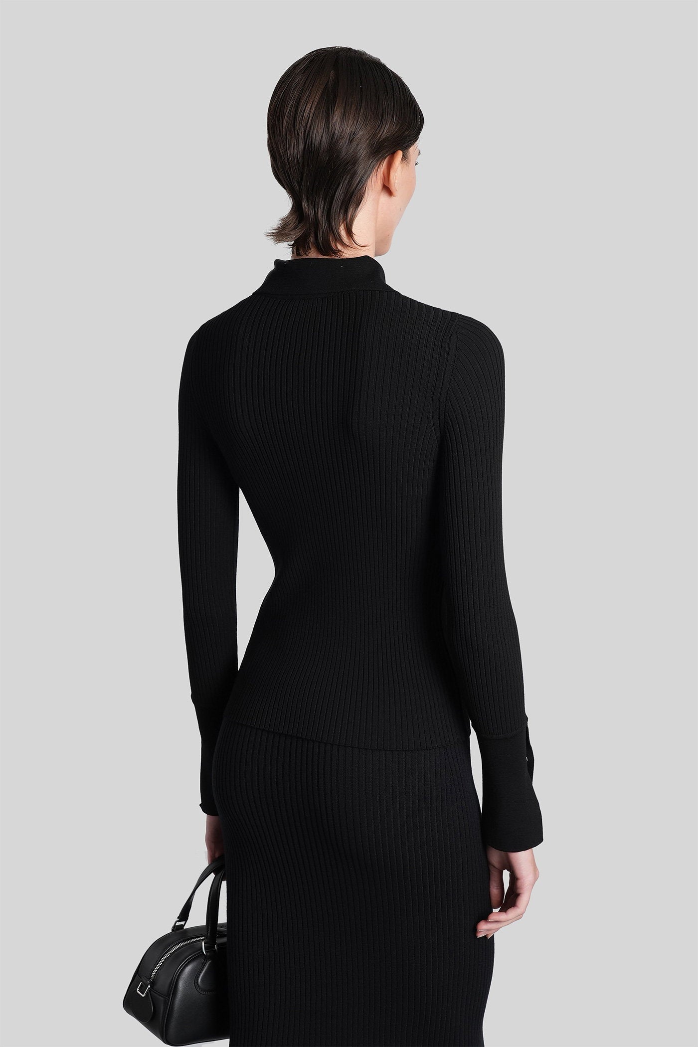 Polo in black viscose Abbigliamento