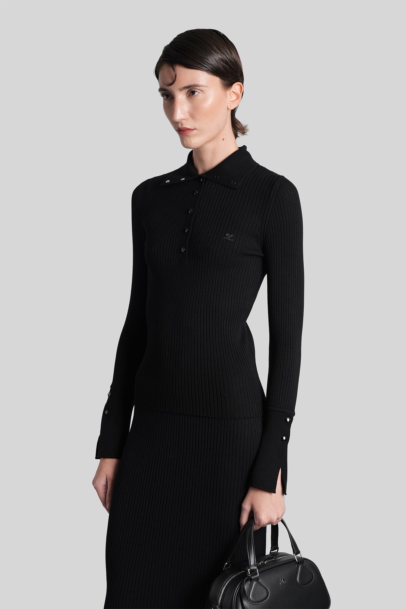 Polo in black viscose Abbigliamento