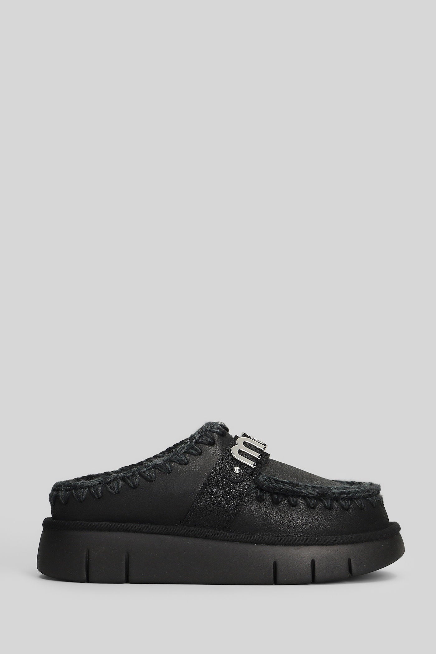 Bounce clog Slipper-Mule in black leather Scarpe