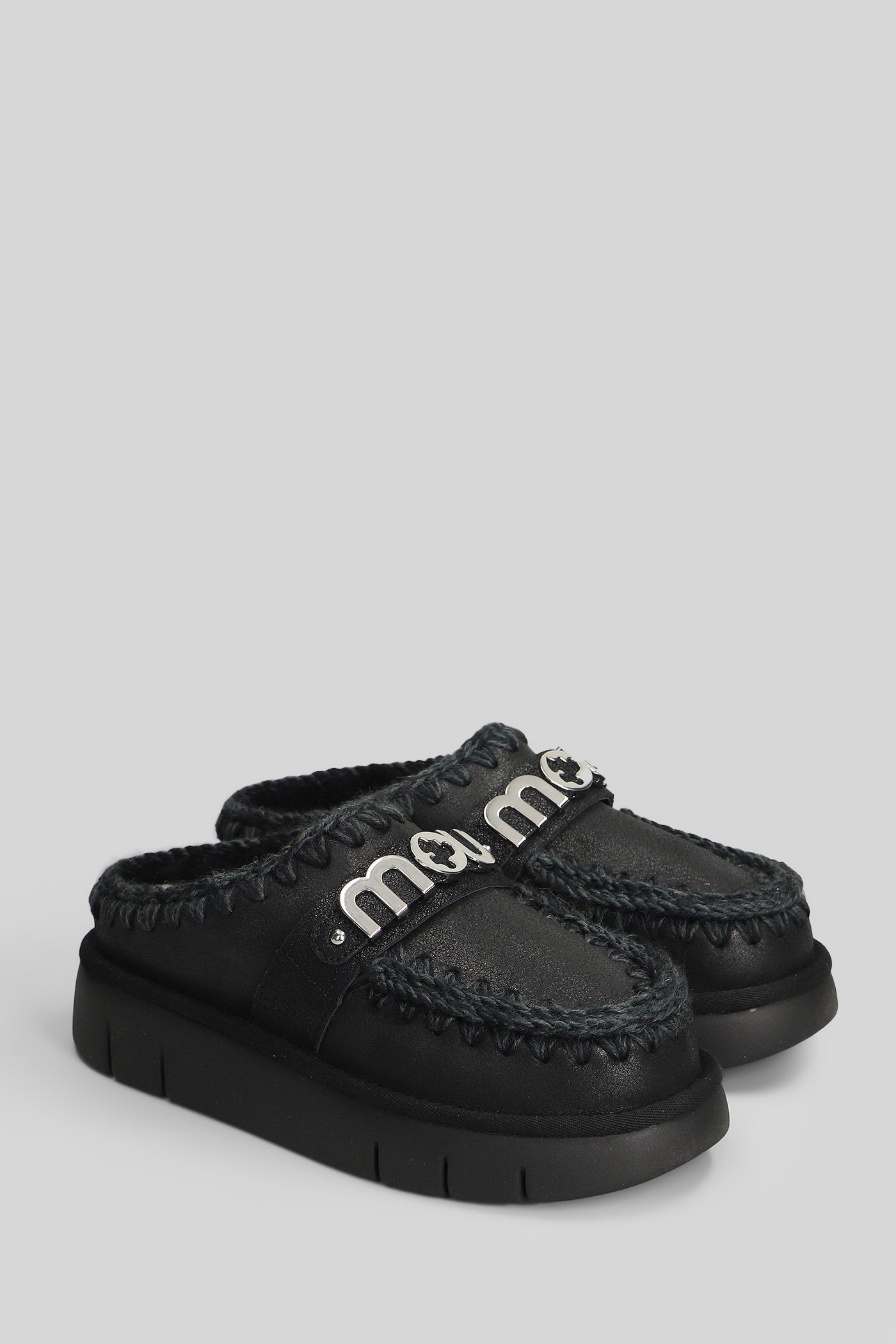 Bounce clog Slipper-Mule in black leather Scarpe