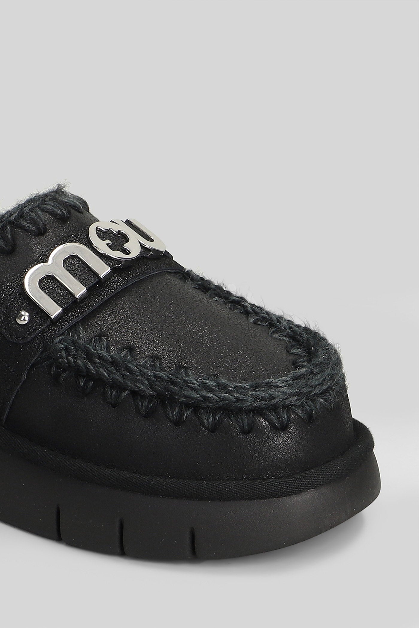 Bounce clog Slipper-Mule in black leather Scarpe
